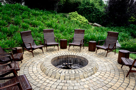 Fire pit with brick inset into the ground